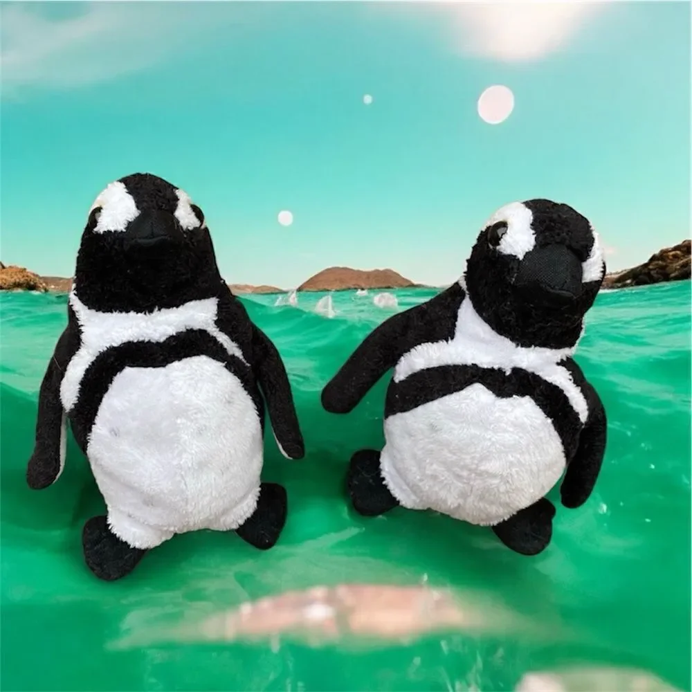 Lot of three stuffed animals from Sea World. One whale (Shamu) & 2 Penguins